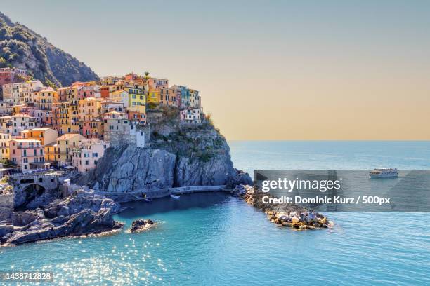 scenic view of sea against clear sky,manarola,la spezia,italy - manarola stock pictures, royalty-free photos & images