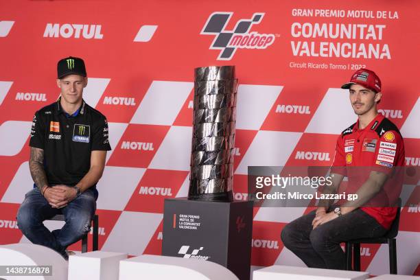 Title contenders Fabio Quartararo of France and Monster Energy Yamaha MotoGP and Francesco Bagnaia of Italy and Ducati Lenovo Team look on during the...