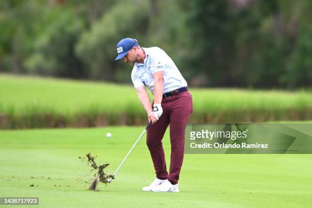 Austin Cook of United States plays a shot on the 17th hole during the first round of the World Wide Technology Championship at Club de Gold El...