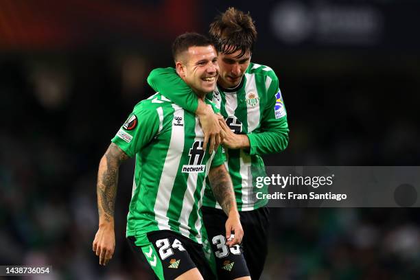 Aitor Ruibal of Real Betis celebrates with team mate Juan Miranda after scoring their sides first goal during the UEFA Europa League group C match...