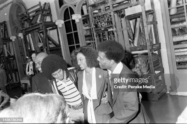 Ted Ross, Michael Jackson, Diana Ross, and Nipsey Russell pose for portraits during a press conference in New York City on September 28, 1977.