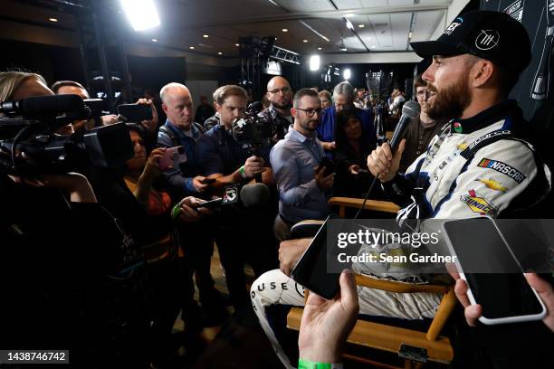 Ross Chastain, driver of the Moose Fraternity Chevrolet, speaks to the media during the NASCAR Championship 4 Media Day at Phoenix Raceway on...