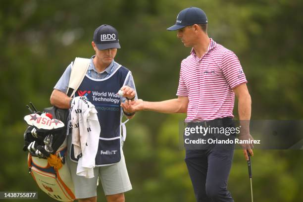 Billy Horschel of United States talks to his caddie on the 6th hole during the first round of the World Wide Technology Championship at Club de Gold...