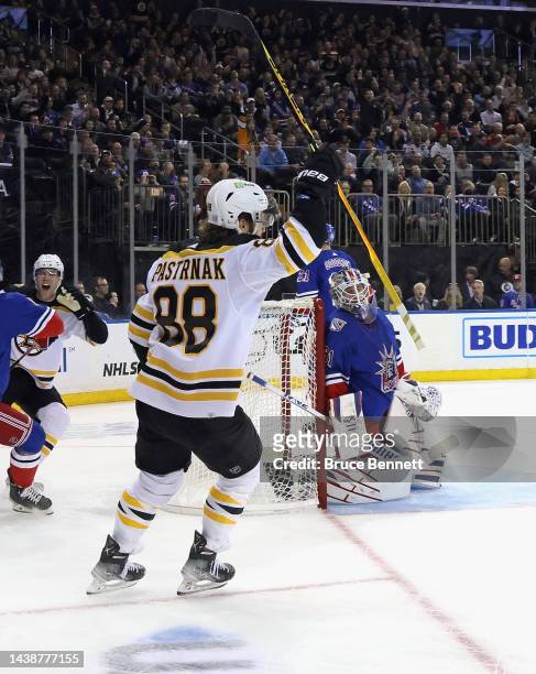 David Pastrnak of the Boston Bruins celebrates his first period goal against Igor Shesterkin of the New York Rangers at Madison Square Garden on...