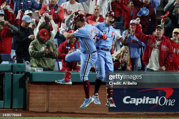 Kyle Schwarber of the Philadelphia Phillies celebrates his home run with teammate Rhys Hoskins during the first inning against the Houston Astros in...