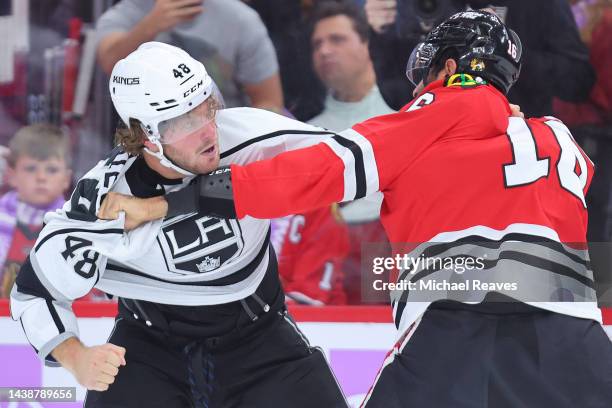 Brendan Lemieux of the Los Angeles Kings and Jujhar Khaira of the Chicago Blackhawks fight during the first period at United Center on November 03,...