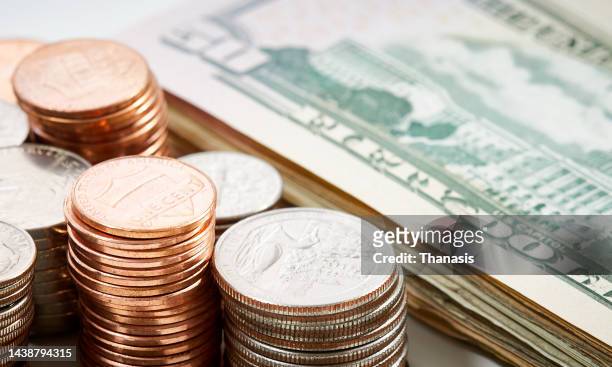 money, us currency, bills and coins - 米国硬貨 ストックフォトと画像
