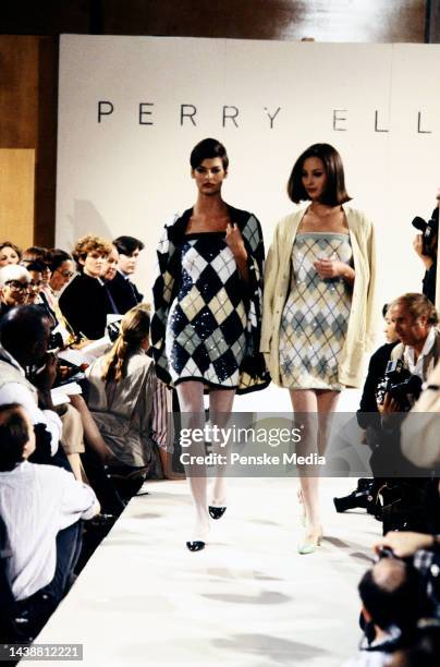 Models Linda Evangelista and Christy Turlington walk runway wearing Perry Ellis ensemble designed by Marc Jacobs. This is Marc Jacob's first spring...