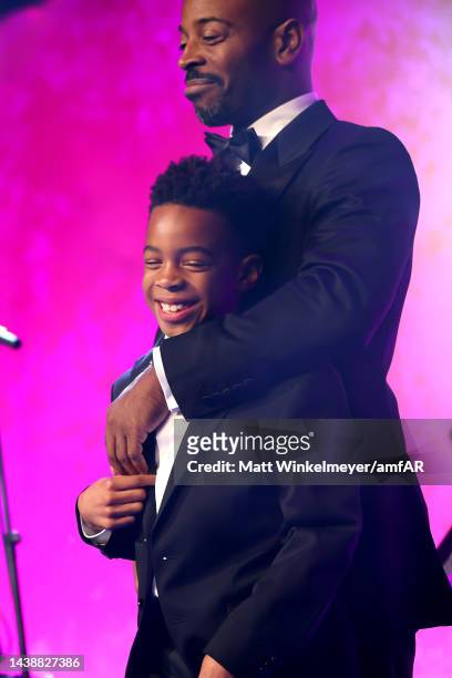 Titan Jewell Weatherspoon and Tim Weatherspoon speak onstage during amfAR Gala Los Angeles 2022 at Pacific Design Center on November 03, 2022 in West...