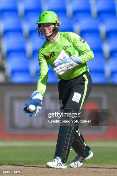 Wicketkeeper Tahlia Wilson of the Thunder in action during the Women's Big Bash League match between the Sydney Thunder and the Brisbane Heat at...