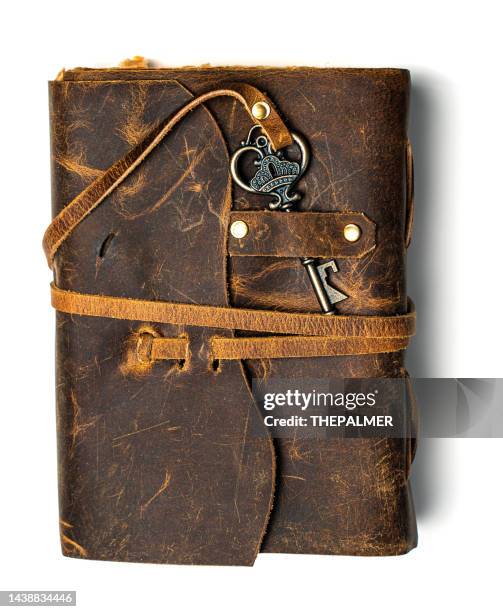 antique leather journal with old key - leather book stock pictures, royalty-free photos & images