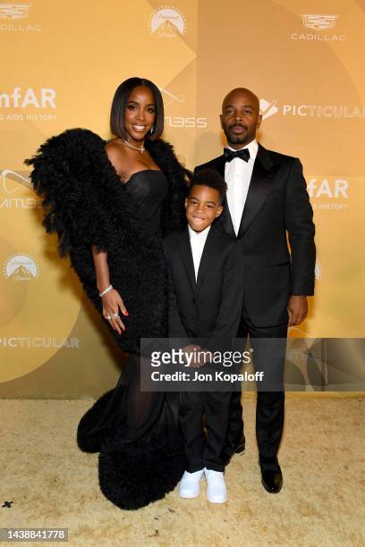 Kelly Rowland, Titan Witherspoon, and Tim Witherspoon attend amfAR Gala Los Angeles 2022 at Pacific Design Center on November 03, 2022 in West...