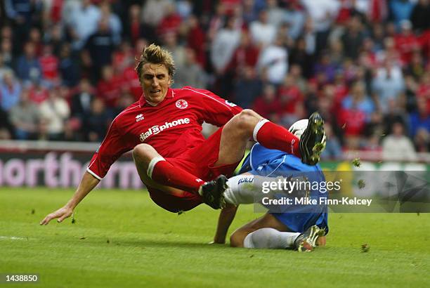 Darren Purse of Birmingham City tackles Alen Boksic of Middlesbrough during the FA Barclaycard Premiership match between Middlesbrough and Birmingham...