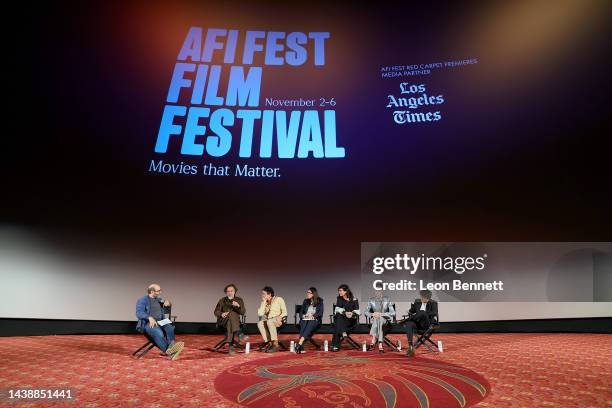 Scott Z. Burns, Alejandro González Iñárritu, Daniel Giménez Cacho, guest, Griselda Siciliani, Ximena Lamadrid, and Íker Sánchez Solano speak onstage...