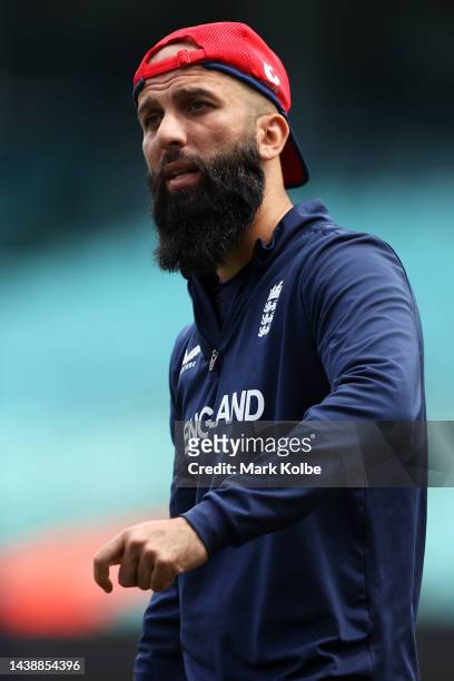 Moeen Ali of England speaks to a team mate during the England T20 World Cup team training session at Sydney Cricket Ground on November 04, 2022 in...