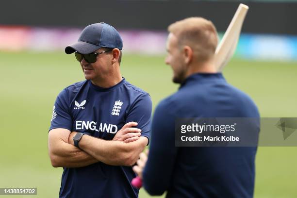 Matthew Mott head coach of England speaks to Liam Livingstone of England during the England T20 World Cup team training session at Sydney Cricket...