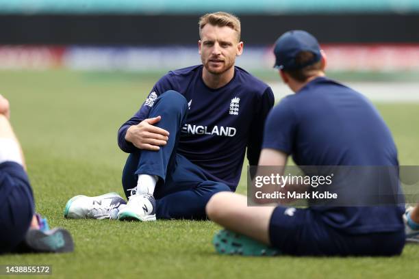 Jos Buttler of England of England speaks to his team mates as they sit on the ground before the England T20 World Cup team training session at Sydney...