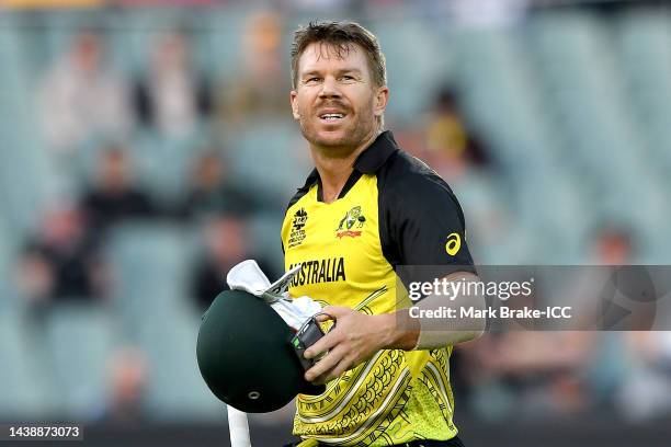 David Warner of Australia reacts to losing his wicket during the ICC Men's T20 World Cup match between Australia and Afghanistan at Adelaide Oval on...