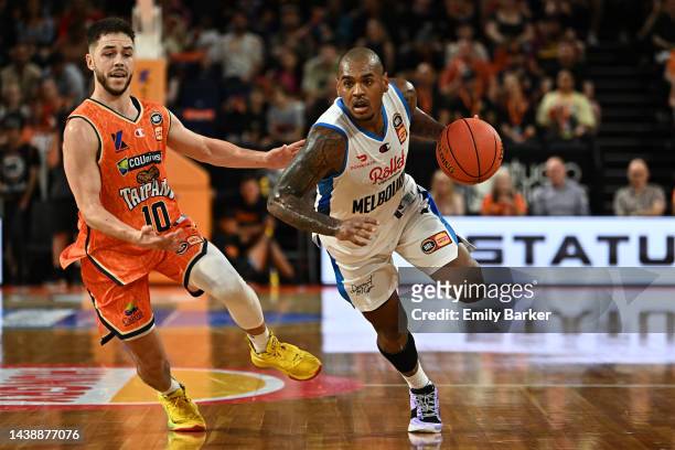 Xavier Rathan-Mayes of Melbourne United drives upcourt during the round six NBL match between Cairns Taipans and Melbourne United at Cairns...
