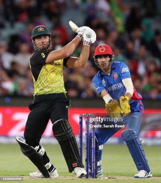 Marcus Stoinis of Australia and Rahmanullah Gurbaz of Afghanistan during the ICC Men's T20 World Cup match between Australia and Afghanistan at...