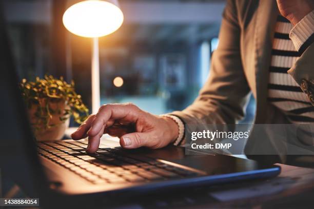 laptop, keyboard and business hands typing with night lamp for job research, company report analysis or online marketing strategy at office desk. copywriting, technology software and employee on pc - google search stockfoto's en -beelden