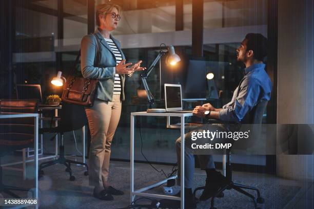 it, business and office workers at night working and talking together on a coding project. dark room with staff communication about web design, technology strategy and iot website update for ux - computer dark room stock pictures, royalty-free photos & images