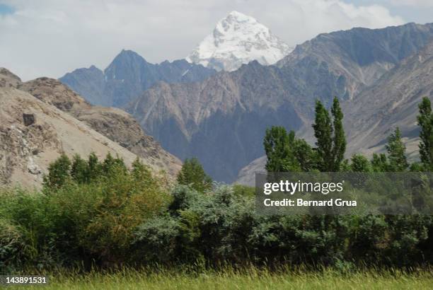 tajikistan over wakhan corridor - bernard grua stock pictures, royalty-free photos & images