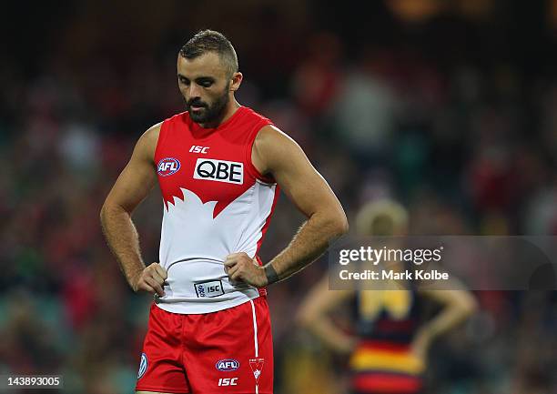 Rhyce Shaw of the Swans looks dejected after a Crows goal during the round six AFL match between the Sydney Swans and the Adelaide Crows at the...