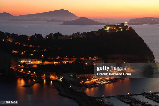 sunset over nisida island - bernard grua stock pictures, royalty-free photos & images