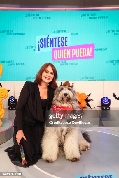 Gabriela Spanic and Batman, the dog of Julian GIl, during taping of show at Univision Studios on October 27, 2022 in Doral, Florida.