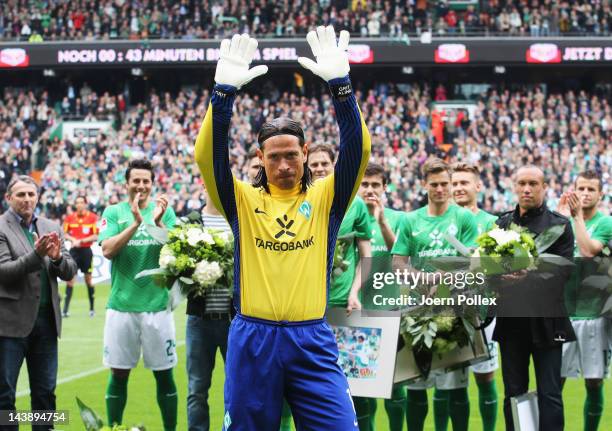 Tim Wiese of Bremen says farewell to the fans prior to the Bundesliga match between SV Werder Bremen and FC Schalke 04 at Weser Stadium on May 5,...