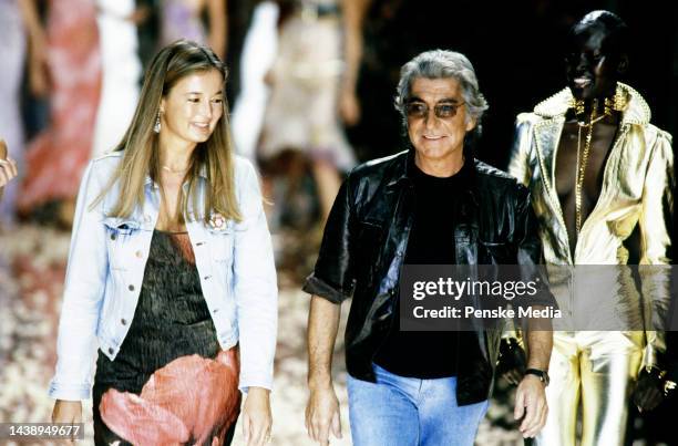 Designer Roberto Cavalli walks the runway at show finale with wife Eva Cavalli and model Alek Wek.
