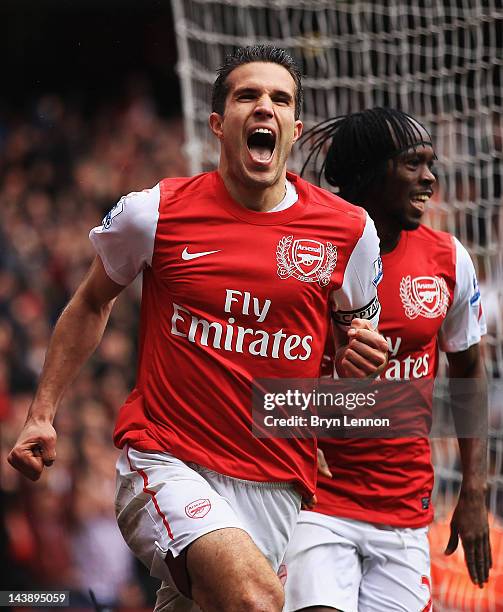 Robin van Persie of Arsenal celebrates scoring their third goal during the Barclays Premier League match between Arsenal and Norwich City at the...