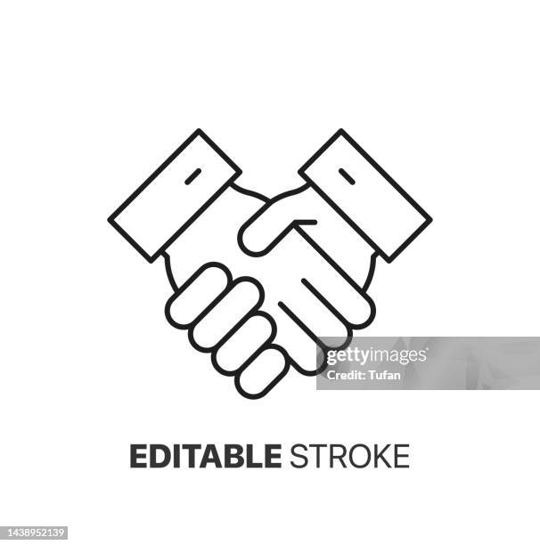 handshake icon and logo. business agreement, shake hands symbol vector - shaking icon stock illustrations