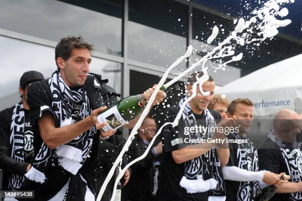 Leandro Grech of Aalen celebrates victory and promotion after the Third League match between VfR Aalen and VfL Osnabrueck at Scholz-Arena on May 5,...