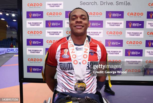 Mackenzie Johnson of USA poses after being named Player of the Match following the Wheelchair Rugby League World Cup Group B match between Scotland...