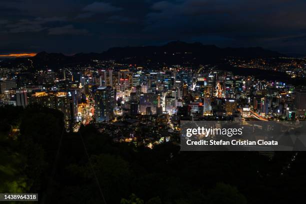 the night view of the city seoul, south korea - namsan seoul stock pictures, royalty-free photos & images