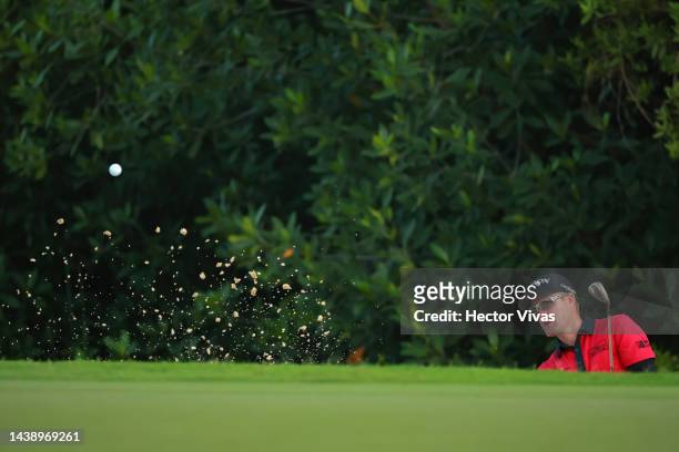 Russel Knox of Scotland plays a shot from the bunker on the second hole during the second round of the World Wide Technology Championship at Club de...