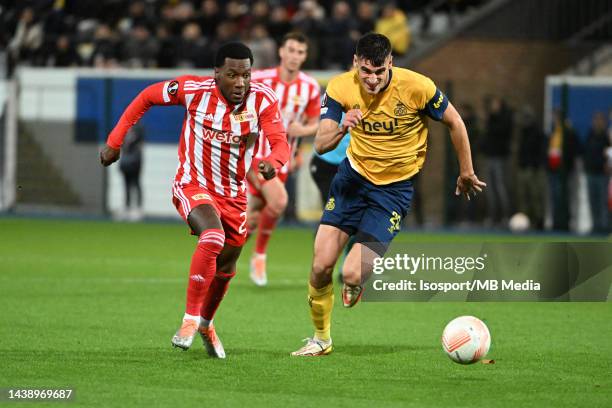 Sheraldo Becker of Berlin battles for the ball with Ross Sykes of Union during the UEFA Europa League group D match between Royale Union...