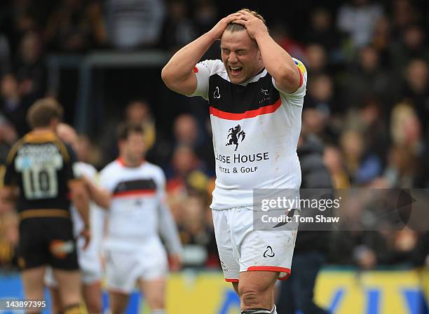 Matt Thompson of Newcastle holds his head in his hands after Newcastle finished bottom of the Premiership during the Aviva Premiership match between...