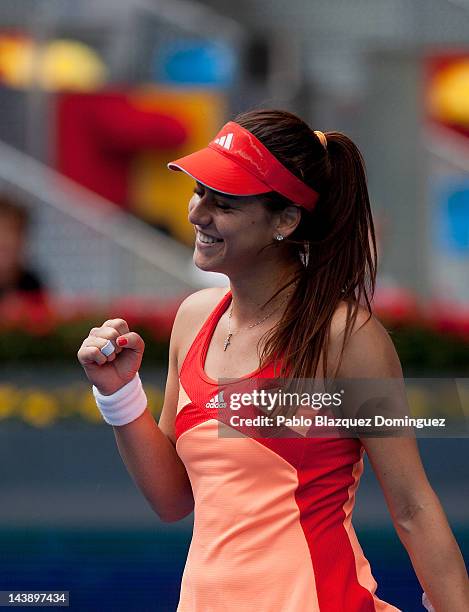 Tennis player Sorana Cirstea of Romania reacts after her victory against Marion Bartoli of France during the first day of the WTA Mutua Madrilena...