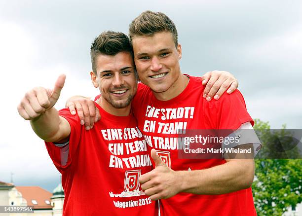 Patrick Wiegers and Thomas Kurz of Jahn Regensburg celebrate after the Third League match between Jahn Regensburg and CZ Jena on May 5, 2012 in...