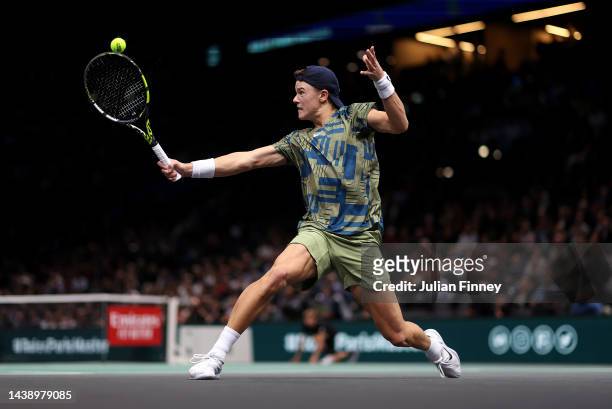 Holger Vitus Nodskov Rune of Denmark in action against Carlos Alcaraz of Spain in the Quarter finals during Day Five of the Rolex Paris Masters...