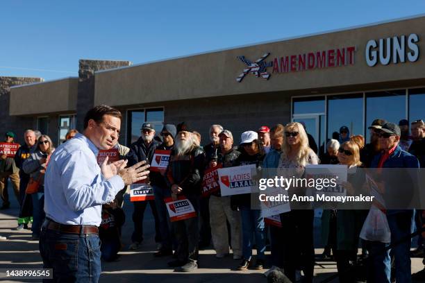 Nevada Republican U.S. Senate nominee Adam Laxalt speaks to supporters at a campaign event at 2nd Amendment Guns & Range store on November 04, 2022...