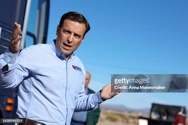 Nevada Republican U.S. Senate nominee Adam Laxalt speaks to supporters at a campaign event at 2nd Amendment Guns & Range store on November 04, 2022...