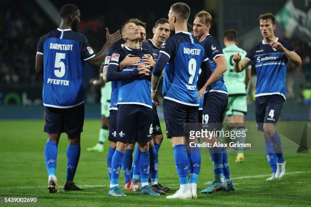 Marvin Mehlem of Darmstadt celebrates their team's first goal with teammates during the Second Bundesliga match between SV Darmstadt 98 and Hannover...