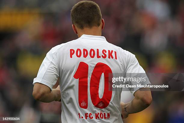 Lukas Podolski of Koeln looks on during the Bundesliga match between 1. FC Koeln and FC Bayern Muenchen at RheinEnergieStadion on May 5, 2012 in...