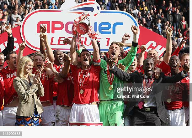 Johnnie Jackson of Charlton lifts the Trophy after winning npower League One, after the match between Charlton Athletic and Hartlepool United, at The...