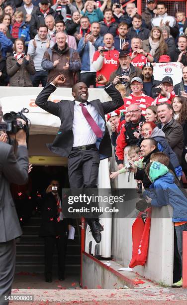 Chris Powell, Manager of Charlton, jumps for joy after winning the npower League One match between Charlton Athletic and Hartlepool United, at The...