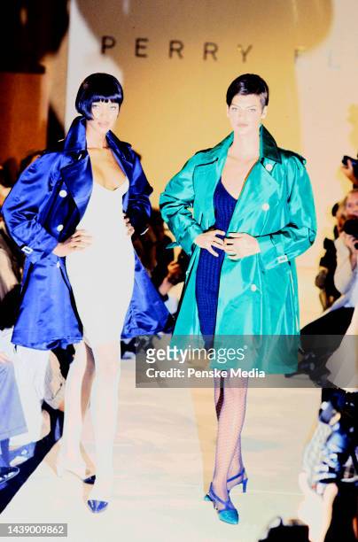 Models Naomi Campbell and Linda Evangelista pose on runway wearing Perry Ellis ensemble designed by Marc Jacobs. This is Marc Jacob's first spring...